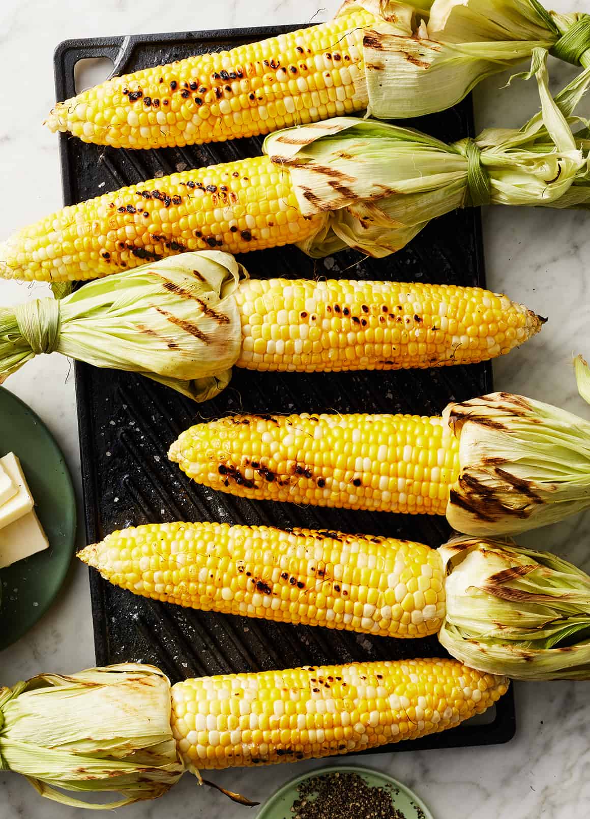 How to grill corn on the cob - fresh corn on the grill with husks tied back
