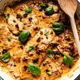Skillet chicken in a rich sun-dried tomato and basil cream sauce.
